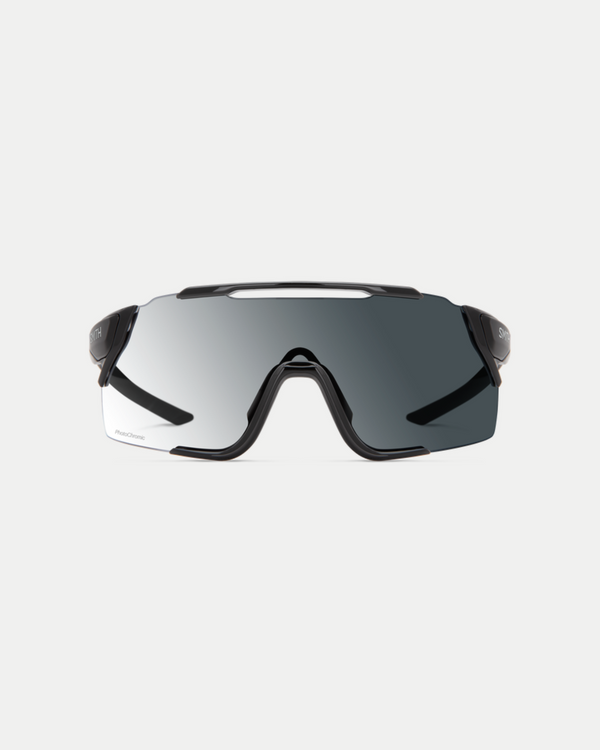 Men's sleek performance sunglasses with maximum coverage and resistant materials in black with a transforming photochromic gray lens.