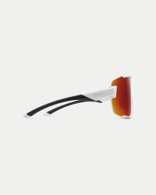 Men's active sunglasses that offer protection and have the coverage of goggles. An easy-to-wear style with a no slip nose piece in matte white/red.