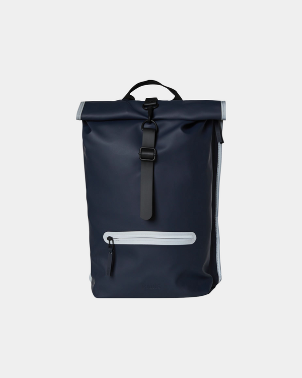 Minimalistic, waterproof backpack with a secure rolltop closure in navy blue with reflective details