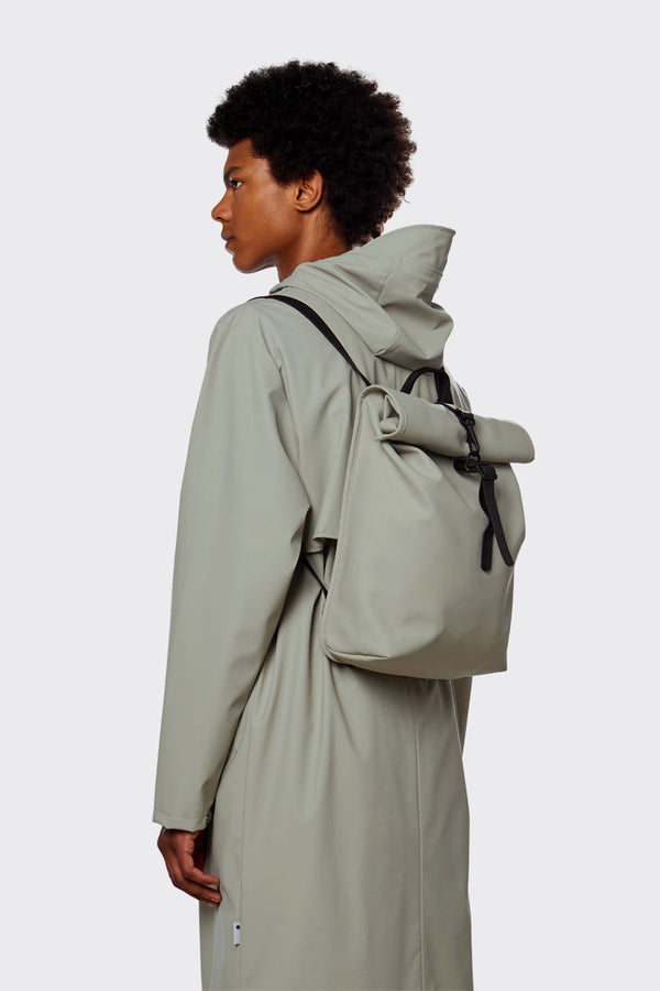 Minimalistic, waterproof backpack with a secure rolltop closure in cement grey