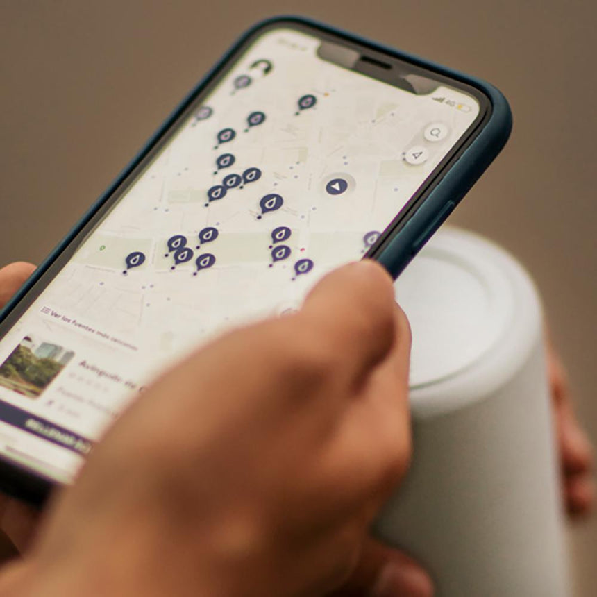 20oz Reusable thermos bottle in white. Patented silicone flap making it hands free with a soft touch.