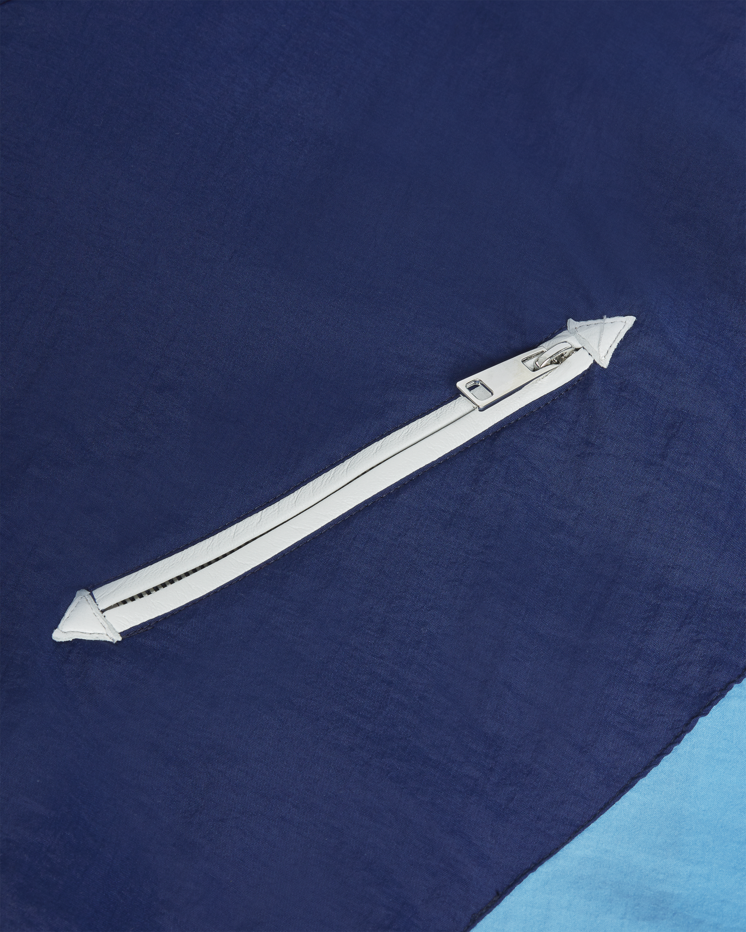 Men's slim fit tracksuit jacket with mixed materials in multi-blue.