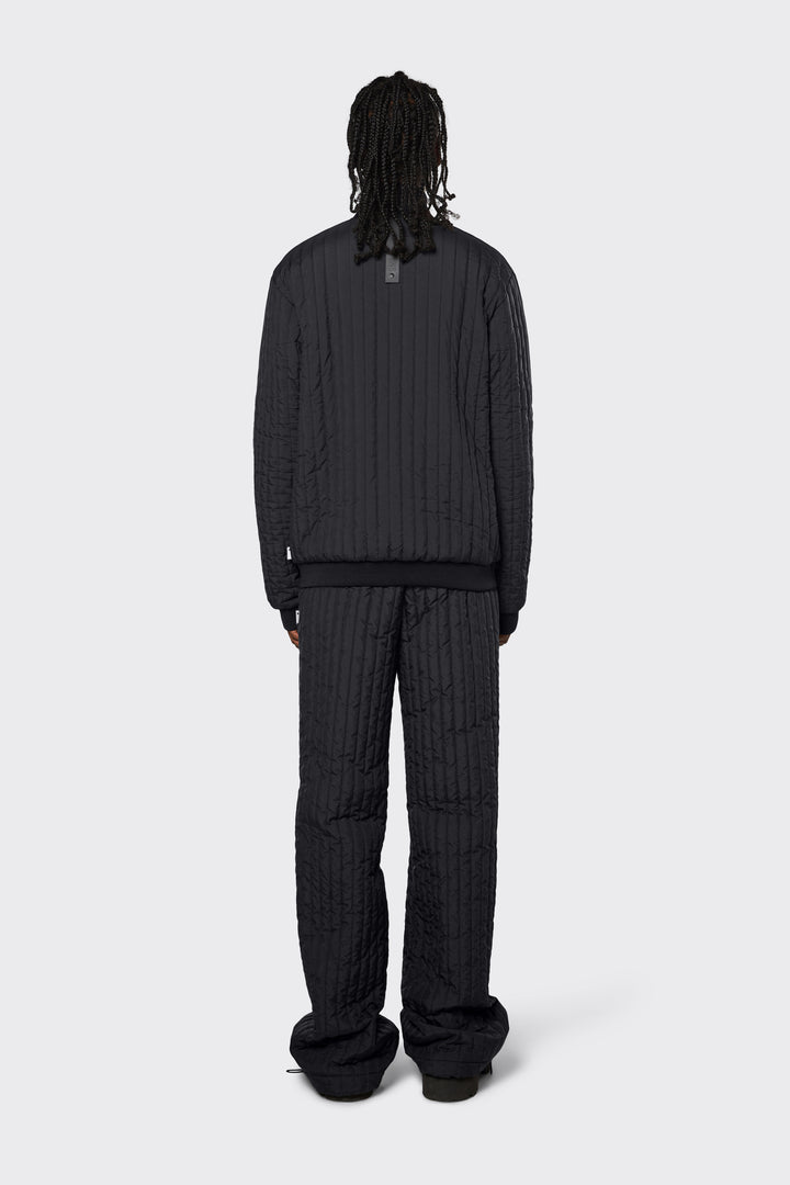 Men's versatile quilted jacket that can be layered and worn day to night in black