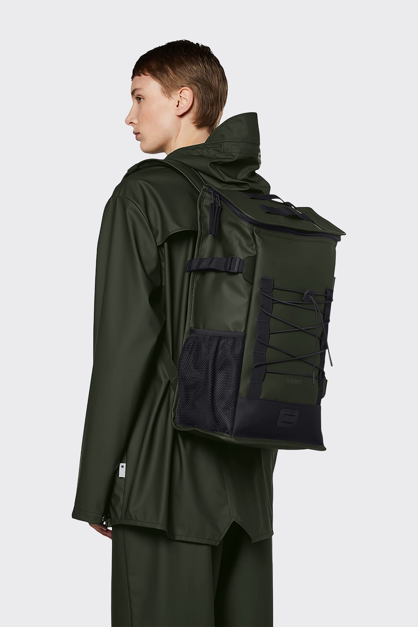 Waterproof, functional and sporty designed mountain backpack in hunter green