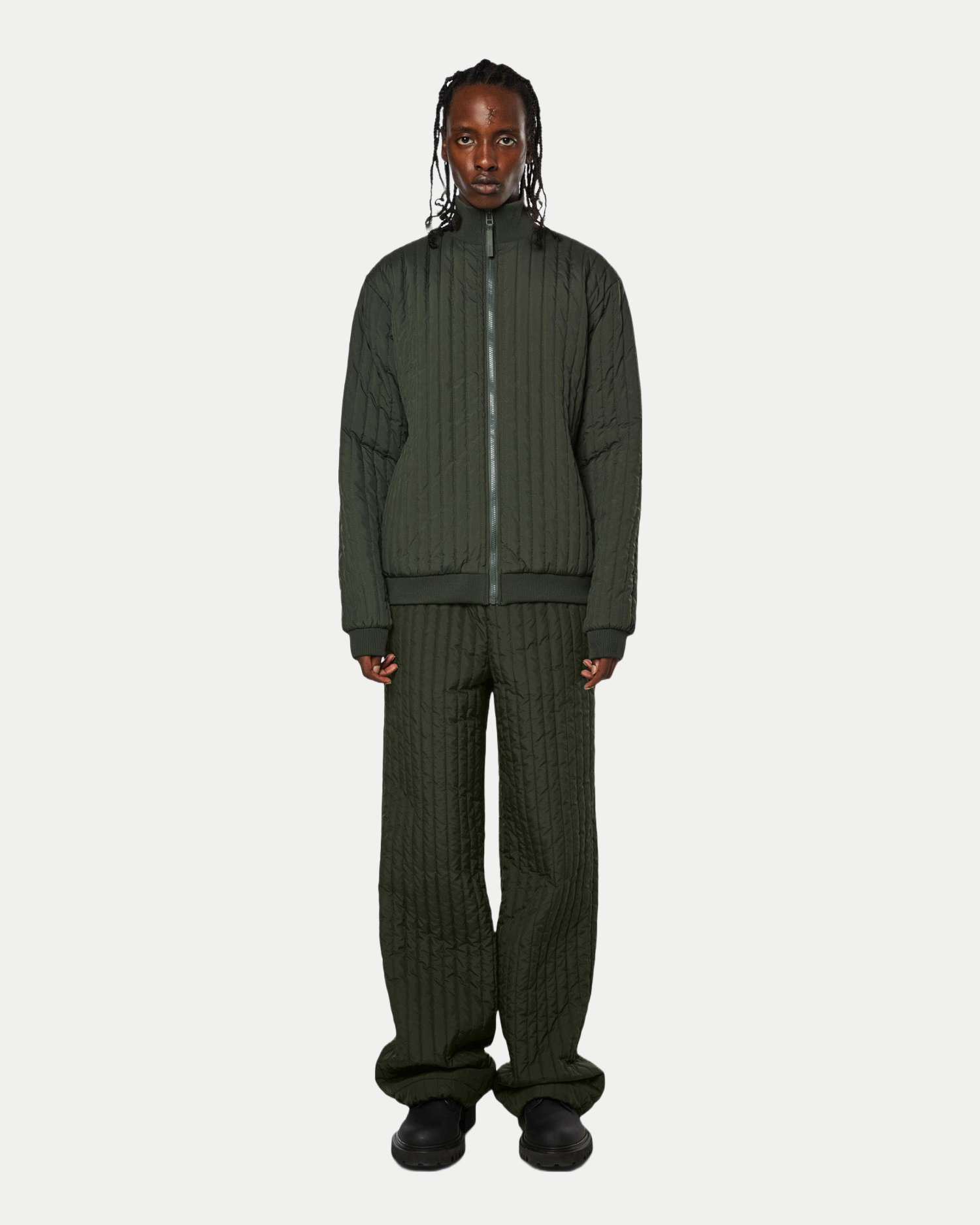 Men's versatile quilted jacket that can be layered and worn day to night in hunter green.