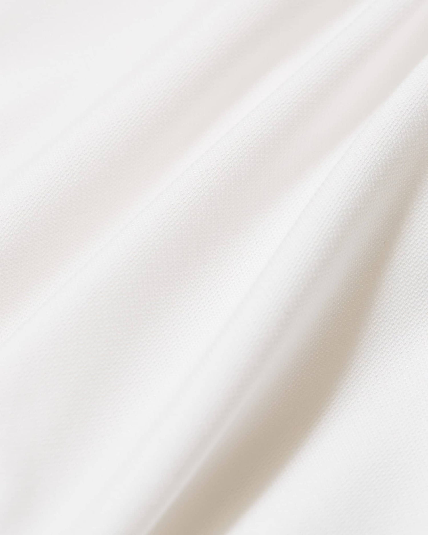 Men's clean cut white golf performance polo.