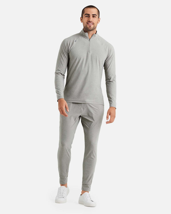 Men's active quarter sleeve zip shirt in heather grey. Comfortable, easy quarter zip shirt for before or after your workout.