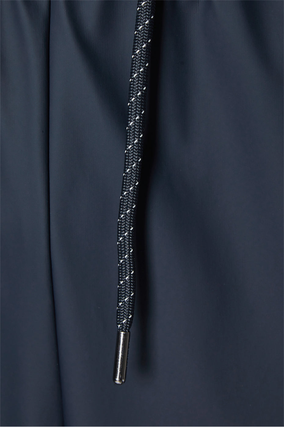 Men's waterproof lightweight track pants in navy with reflective side stripe