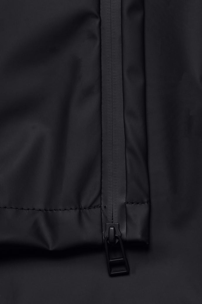 Men's waterproof slim fit pants with bottom zip closures in black 