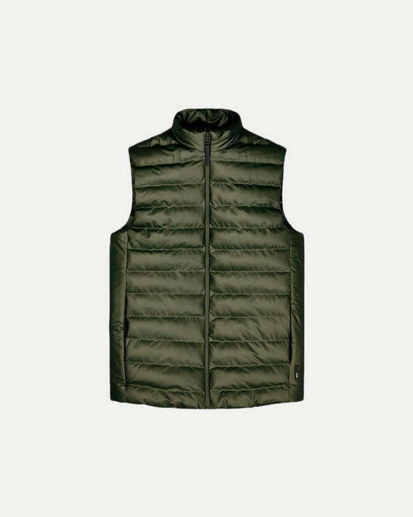 Men's waterproof transitional puffer vest in color evergreen