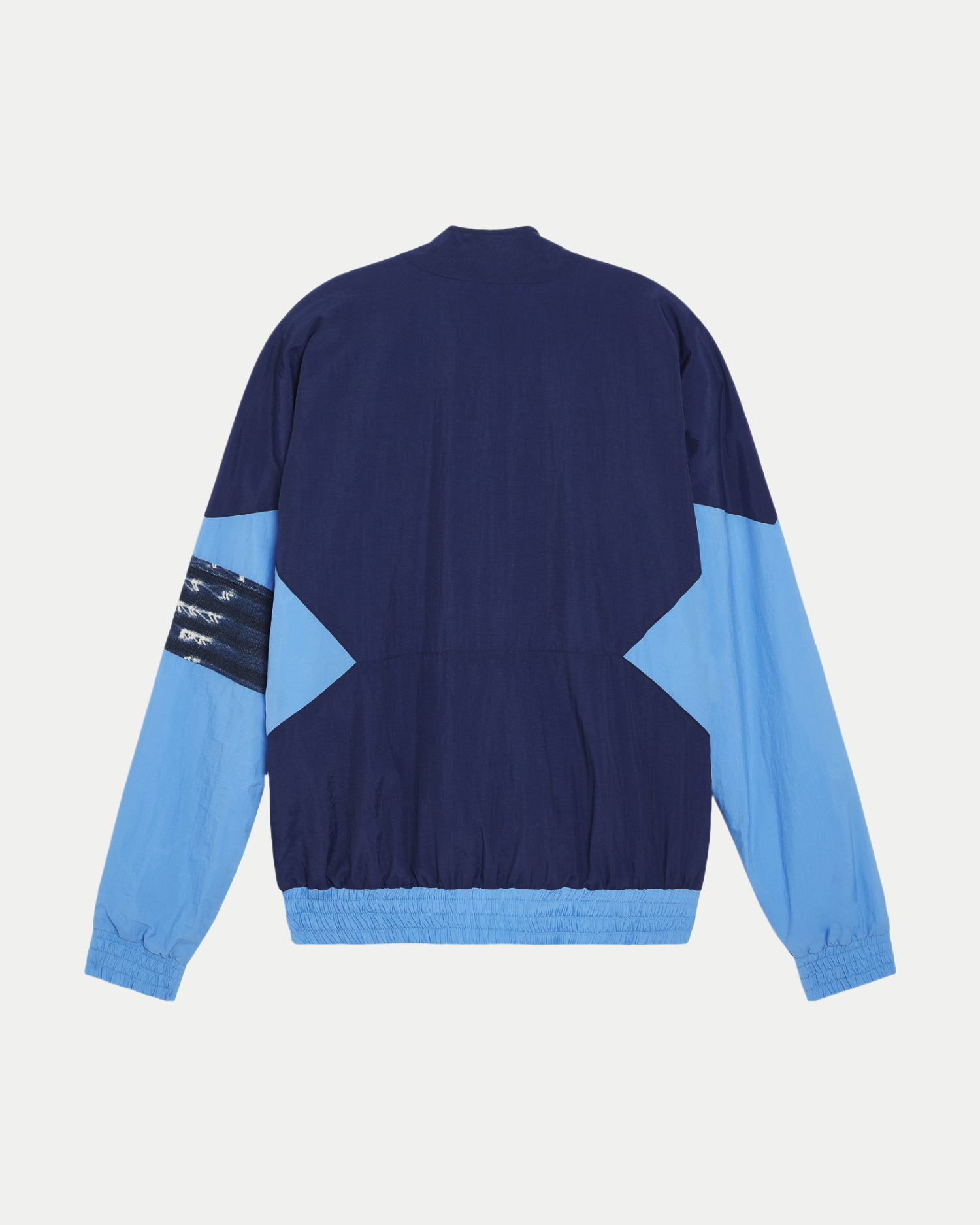 Men's slim fit tracksuit jacket with mixed materials in multi-blue.