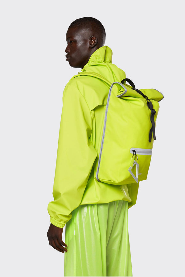 Minimalistic, waterproof backpack with a secure rolltop closure in lime green with reflective details