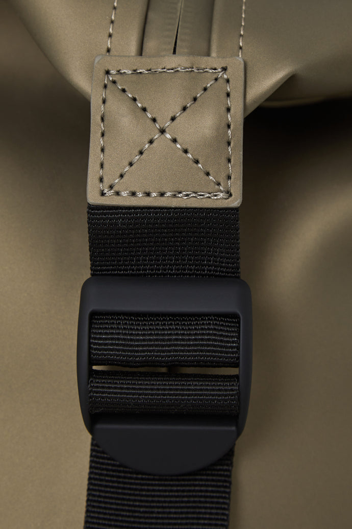 Waterproof, minimalistic duffel bag with a single main compartment in metallic bronze