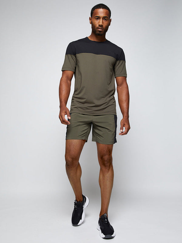 Men's 7 inch lined training short in army green/black