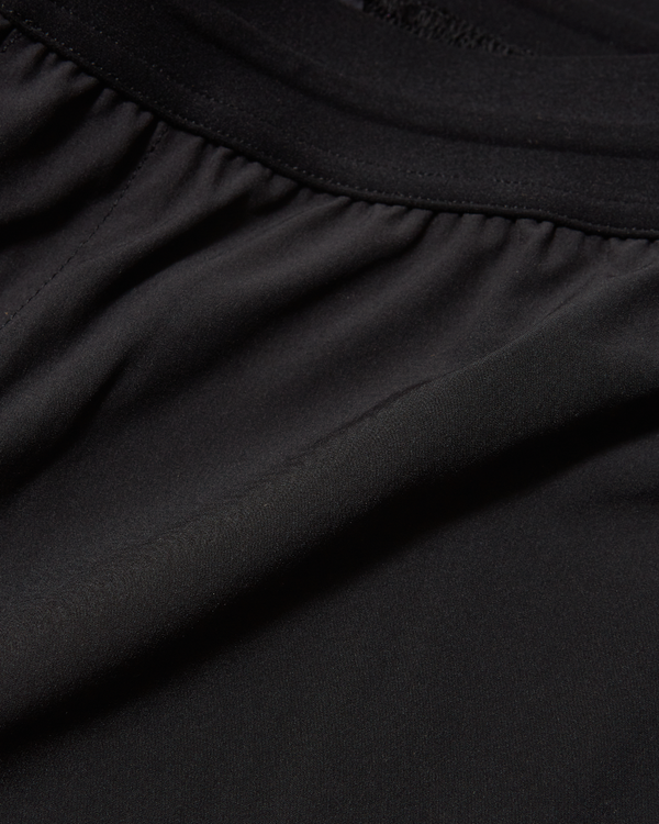 Men's 7 inch lined training short in black with moisture wicking technology. 